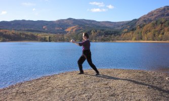 tai chi ball at the waterside