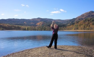 tai chi ball into the sun - wearing sunshades