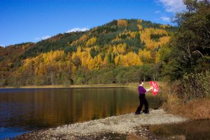 tai chi fan beside the water