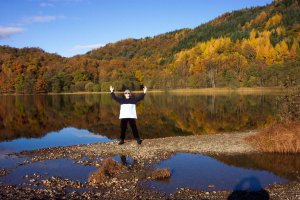 tai chi moves reflected in a calm lake